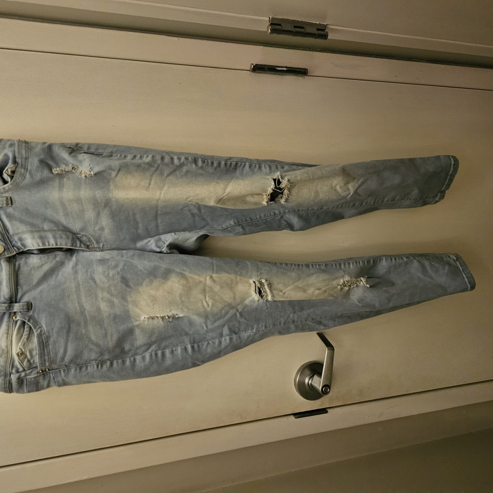 Women's Distressed Blue Jeans